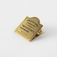 Travelers Company Brass Clip Logo